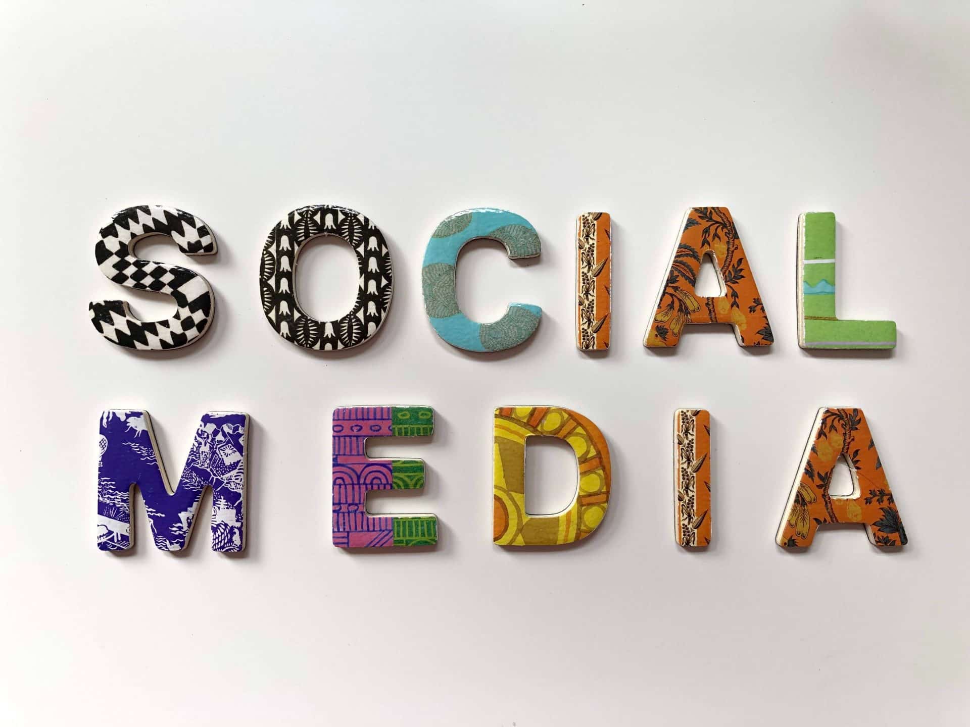 Multicolored lettering spells out Social Media. Creative Repute can create social media templates and marketing strategies