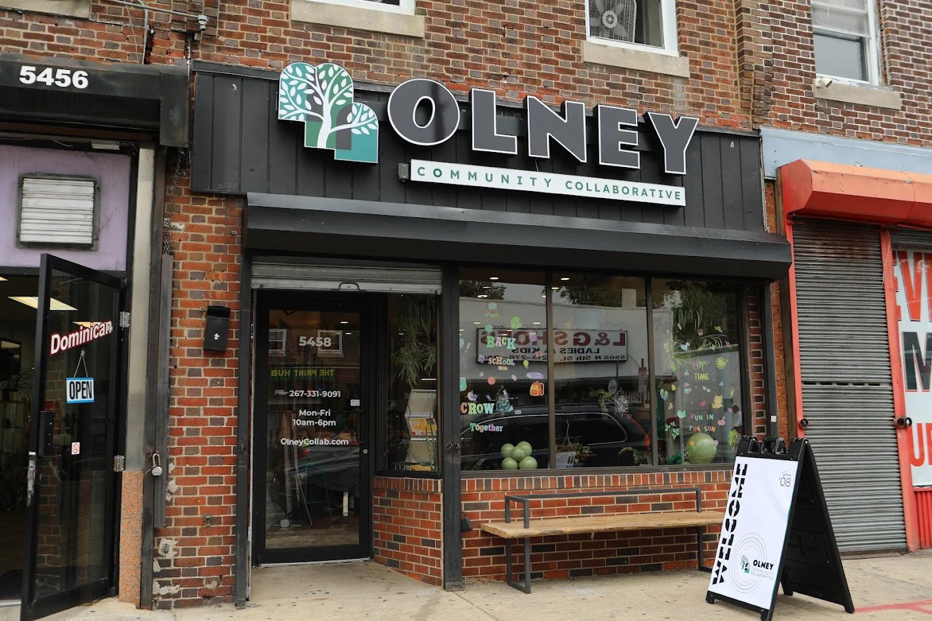 OCC Olney Community Collaborative Logo Storefront celebrate opening and community space