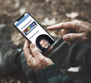 mockup of senior man on mobile device looking at William Way Elder Initiative Resources page